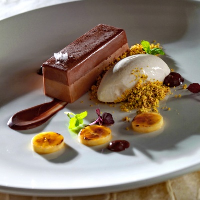 Milk chocolate mousse with chocolate jelly, pistachio crumble and banana ice-cream | Yiannis Lucacos