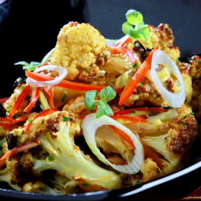 Cauliflower with curry and raisins | Yiannis Lucacos
