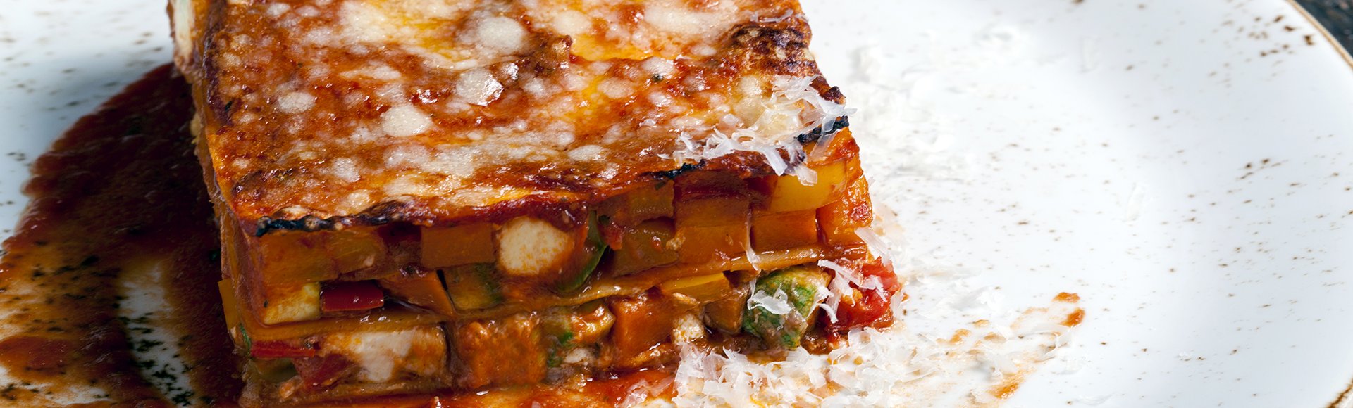 Lasagna with vegetables and xinomyzithra cheese