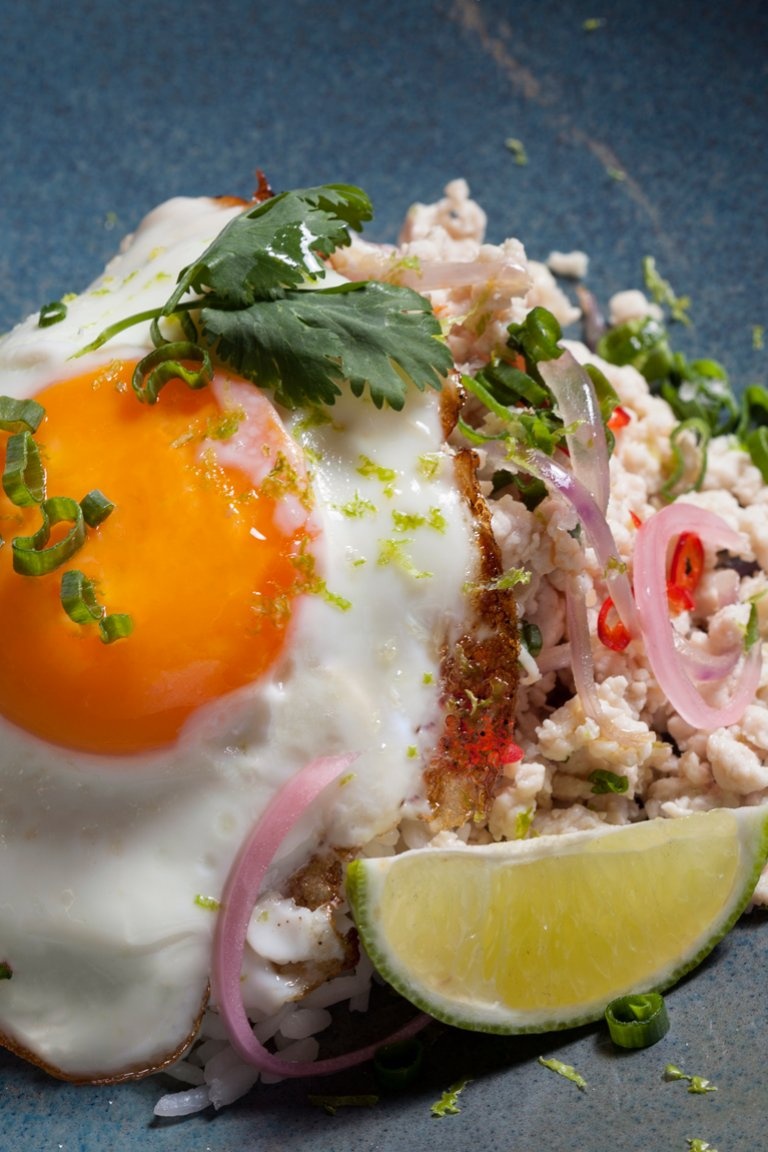 Pad Krapao chicken mince with steamed rice, fried egg and fresh coriander