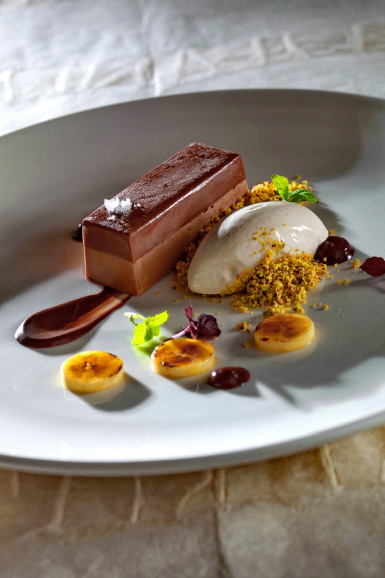 Milk chocolate mousse with chocolate jelly, pistachio crumble and banana ice-cream