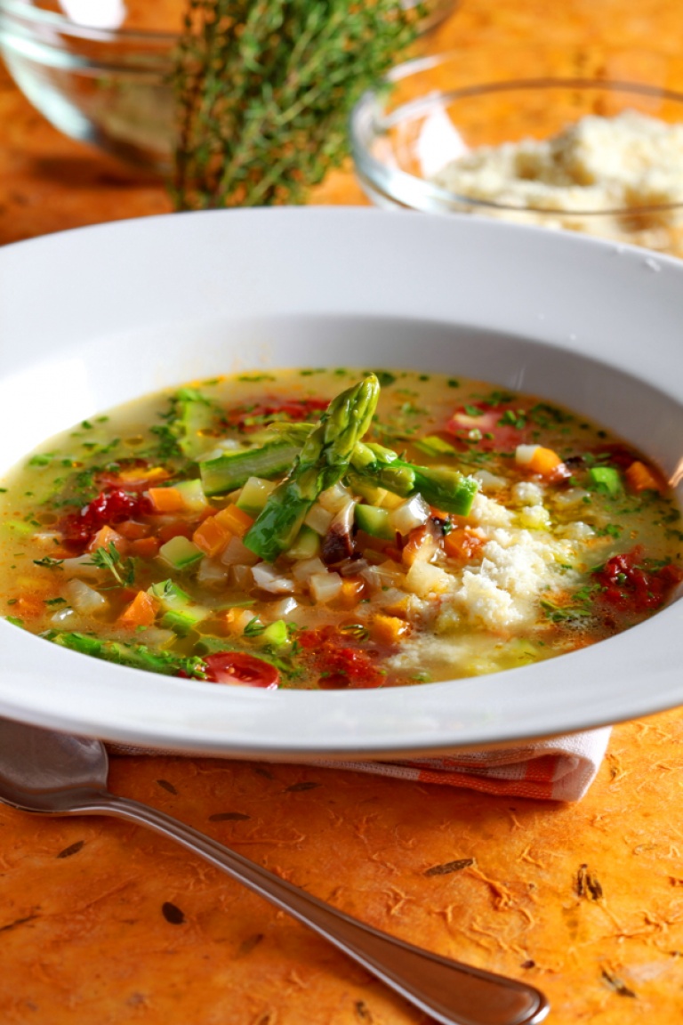 Chicken soup with vegetables and Parmesan